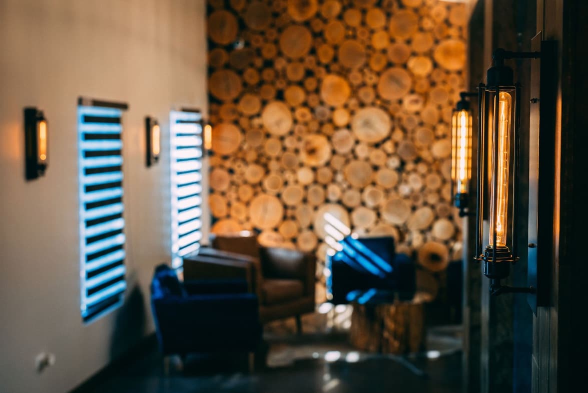 Cozy lounge nook against the clubhouse's log wall